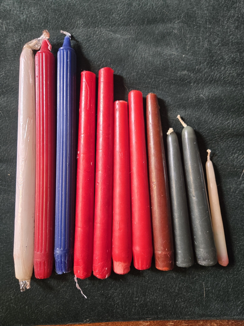 Assorted Antique Taper Candles in Red, Blue, Brown, Green and Cream